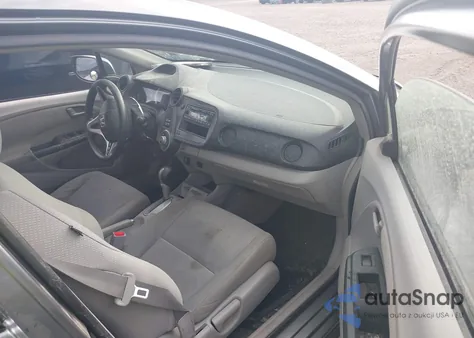 2011 Honda Insight from USA, damaged, VIN JHMZE2H34BS005548